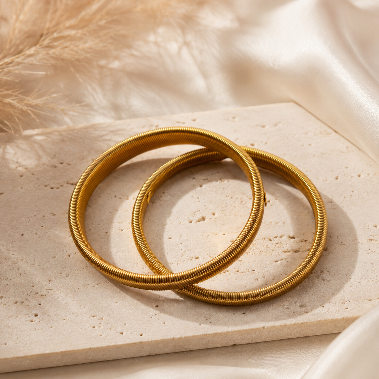 Wolff Jewelry - Ærmeholder (2 stk) guldfarvet