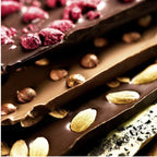 ØKOLADEN - ØKOLOGISK MØRK 70% CHOKOLADE - HASSELNØDDER - 75 g.